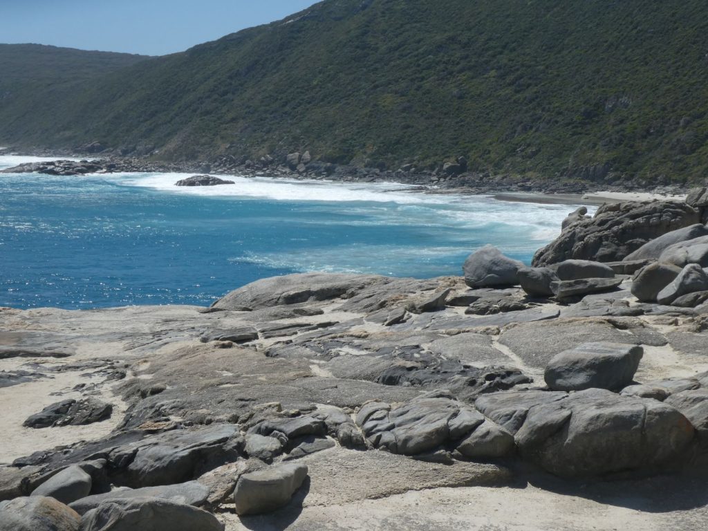 Blowholes through granite rock.