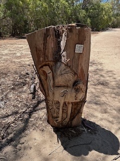 Wooden emu sculpture with QR code for dreamtime story.