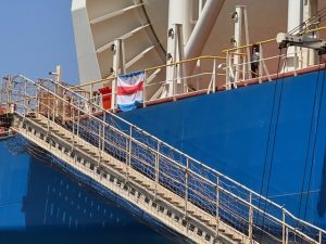 The St George Flag hangs over the ship to show the Seafarers centre they need a supplies or transport to land.